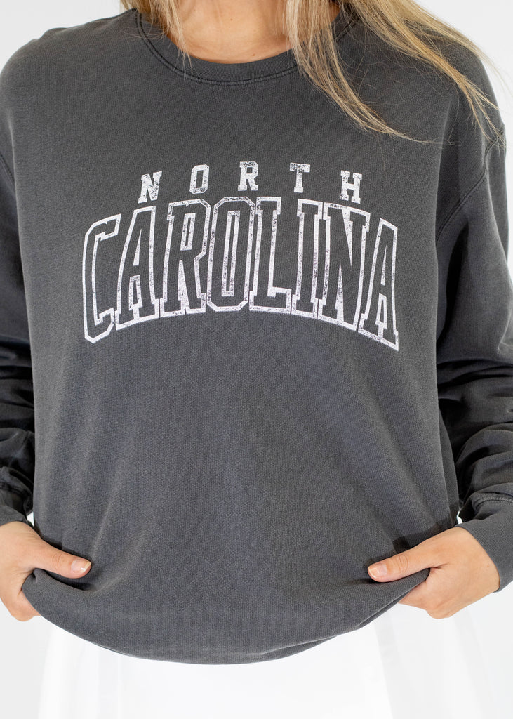 gray crew neck sweatshirt with white North Carolina print