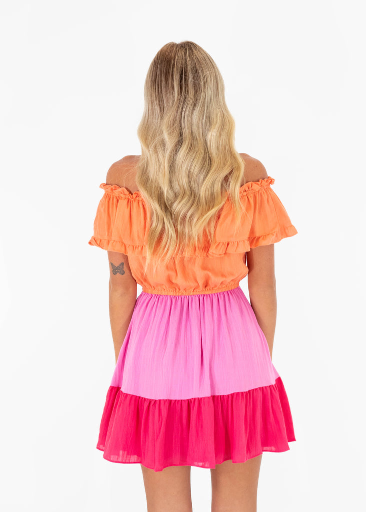 orange and pink layered off shoulder dress